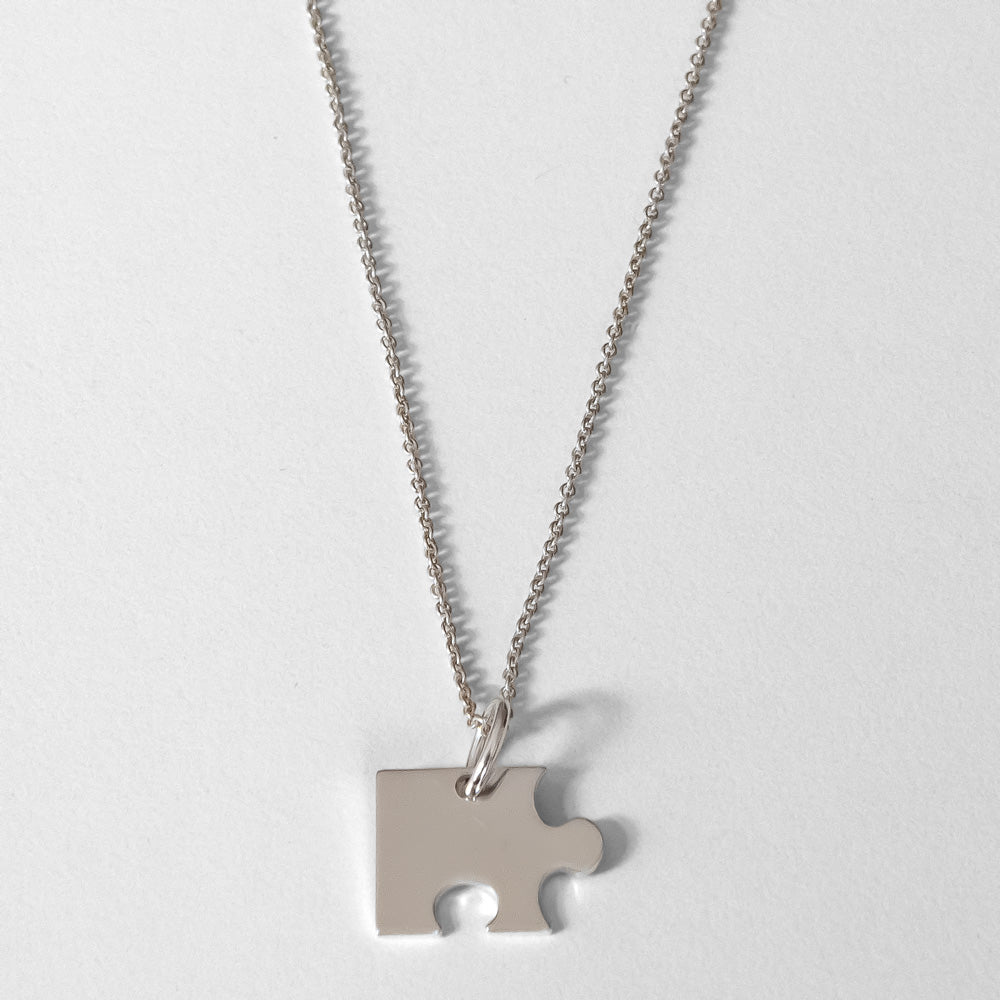 T h e Puzzle Halsband